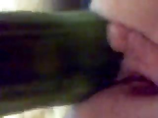 wife using cucumber on pussy.
