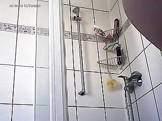 Curvy aunt with huge hangers getting into shower